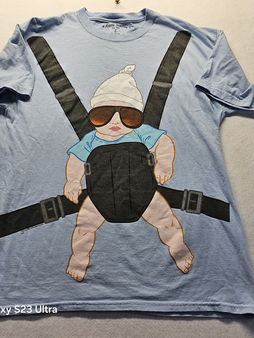 Ripple Junction Light Blue Baby Graphic Tee with Black Harness Print
